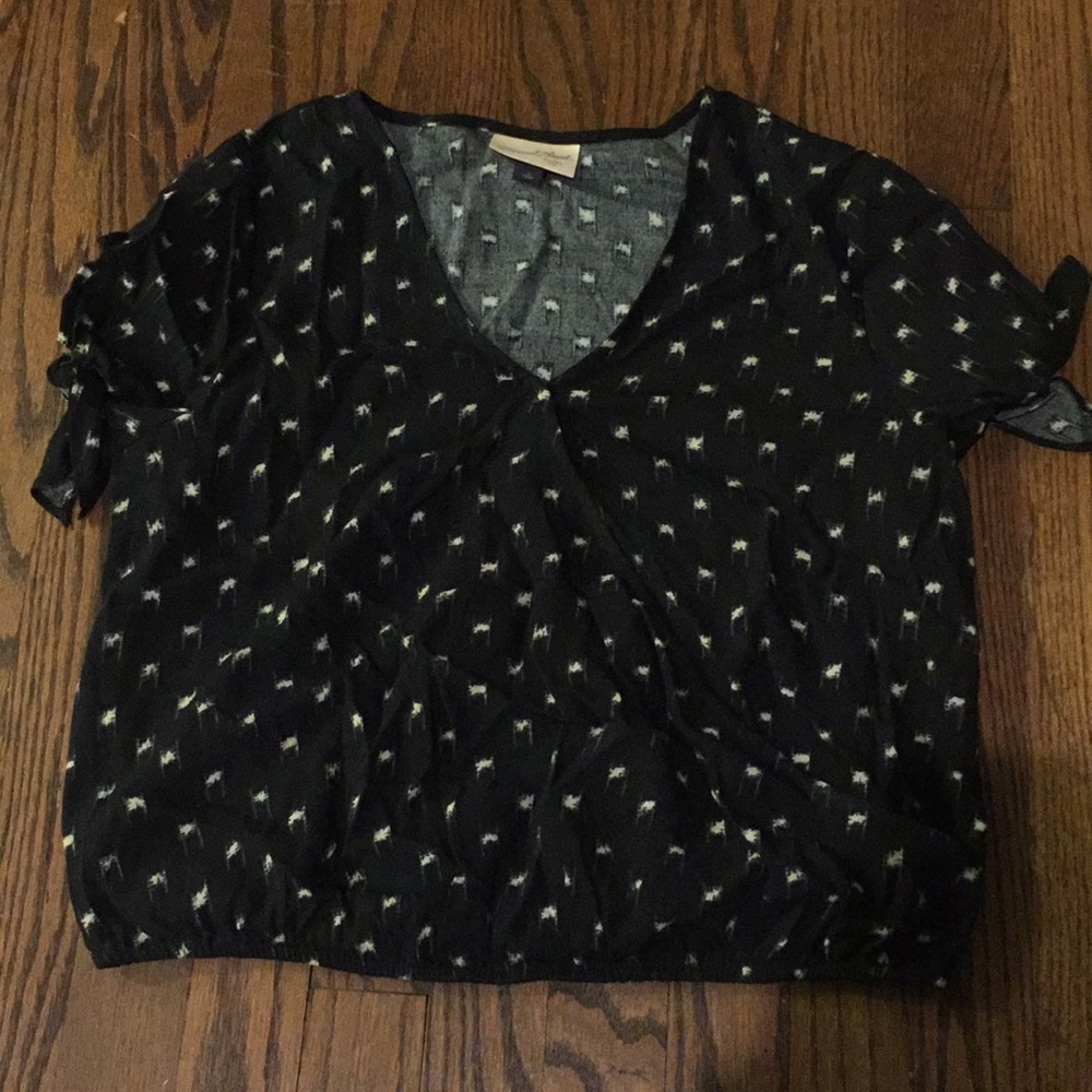 Cute patterned very light blouse